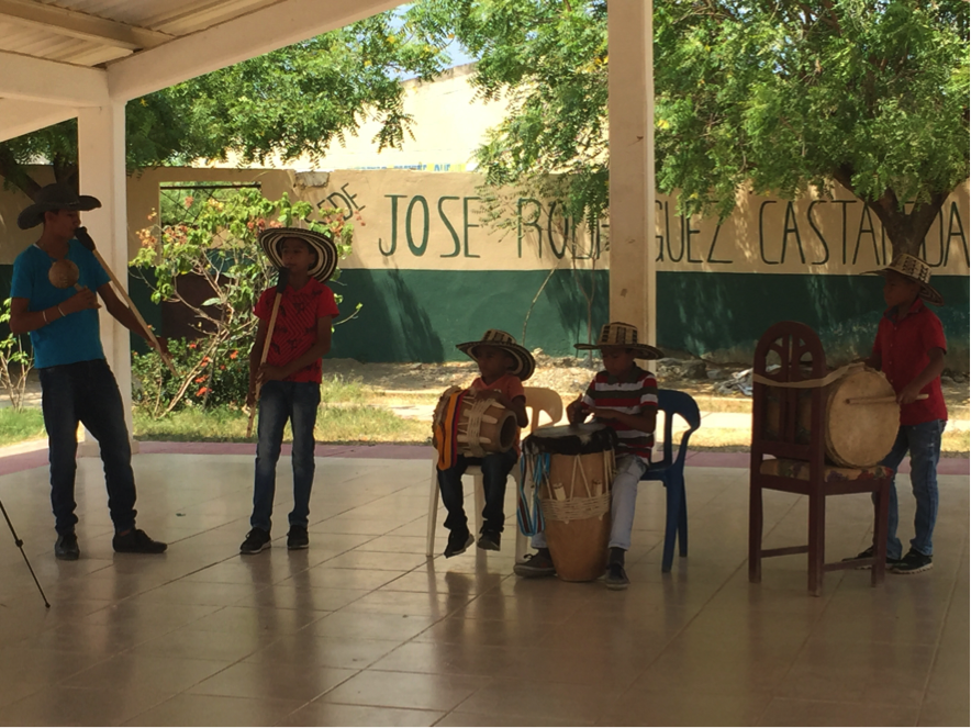 Photograph of Gaiteritos performing on flutes and drums